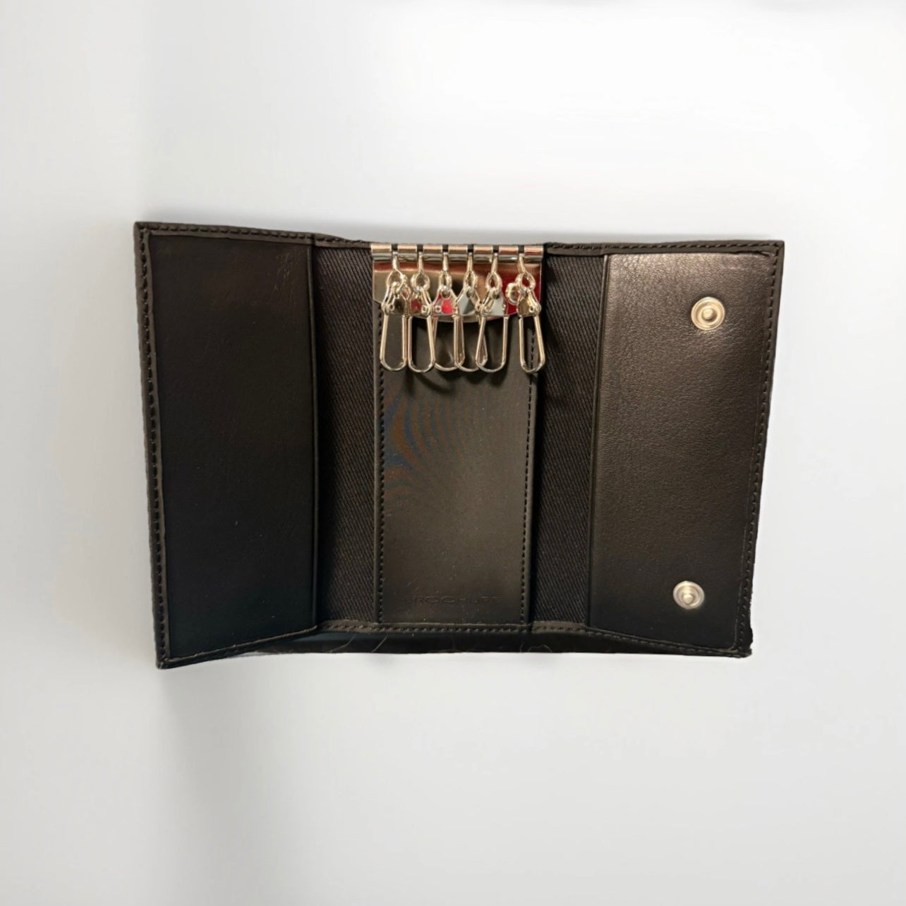 BROCHURE PORTACHIAVI IN TESSUTO IMPERMEABILE NERO